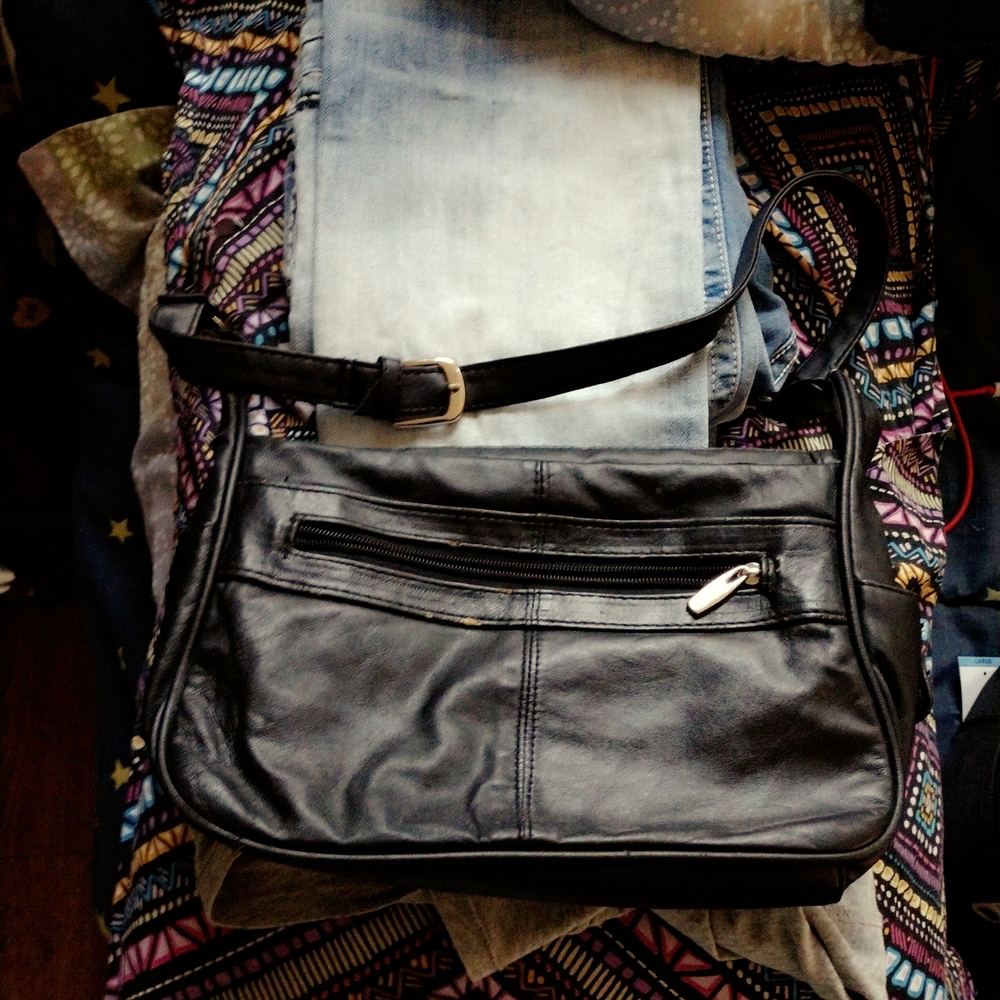 Black Crossbody Bag with Adjustable Strap and Flap Closure